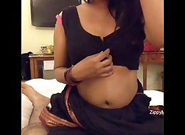 Hot Desi Bhabhi Showing Big Boobs n Putting in Condom on Dick
